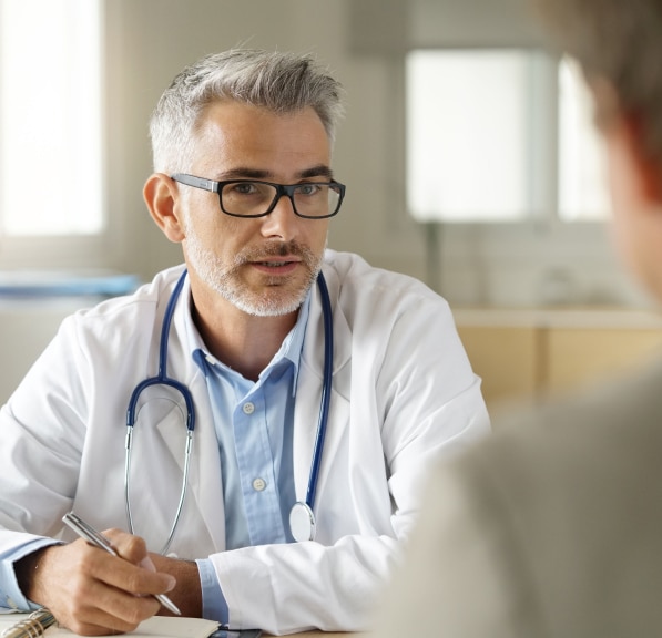 Doctor speaking with a patient during a medical consultation